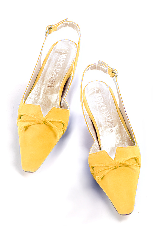 Yellow women's open back shoes, with a knot. Tapered toe. Low kitten heels. Top view - Florence KOOIJMAN